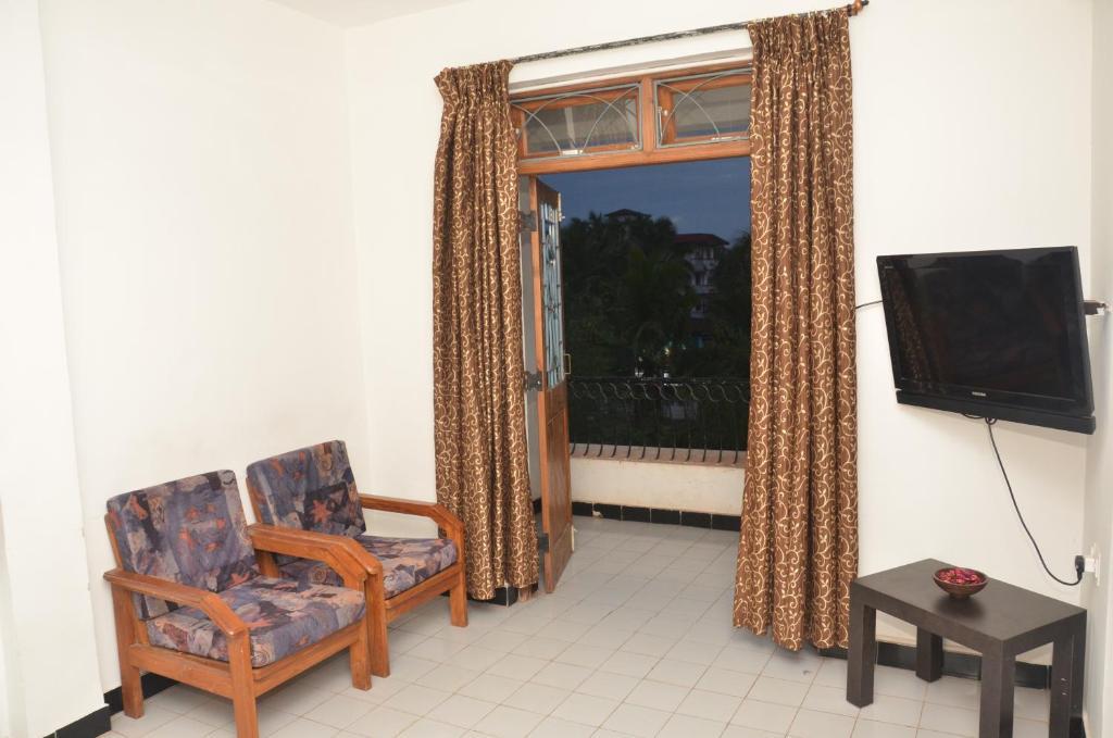 Sunkissed Plaza Hotel Calangute Szoba fotó