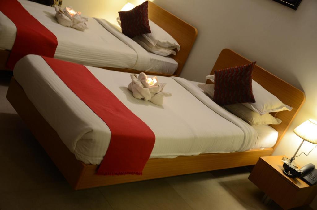 Sunkissed Plaza Hotel Calangute Szoba fotó