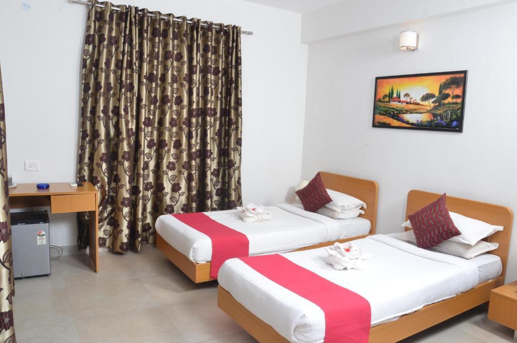Sunkissed Plaza Hotel Calangute Szoba fotó